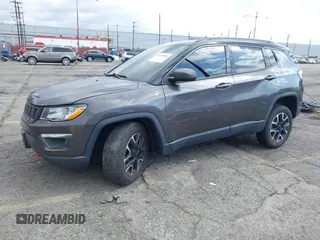 2021 Jeep Compass Trailhawk with VIN 3C4NJDDB6MT561074, listed as a IAAI auction lot 42125886 with 77,293 mi miles and . Bid and sale history available at DreamBid. Image 23.