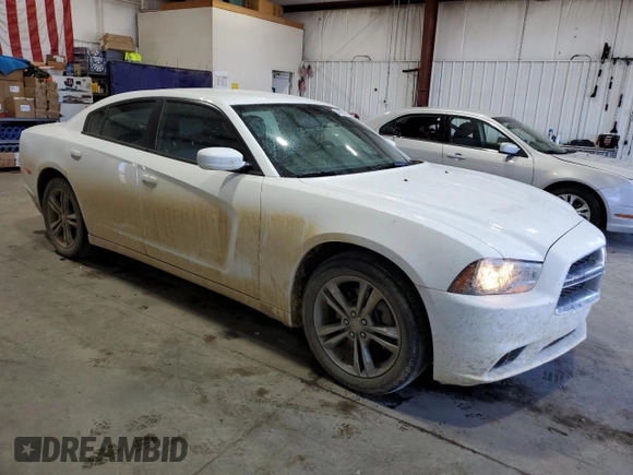 2014 Dodge Charger SXT Plus with VIN 2C3CDXJG4EH264500, listed as a Copart auction lot 64950504 with 156,850 mi miles and Salvage Title. Bid and sale history available at carsss.com. Image 4.