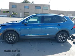2018 Volkswagen Tiguan SEL with VIN 3VV2B7AX9JM204108, listed as a IAAI auction lot 42504747 with 87,379 mi miles and . Bid and sale history available at DreamBid. Image 14.