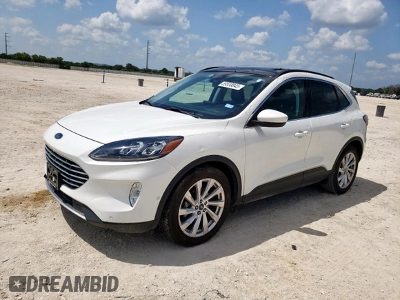 2021 Ford Escape Titanium Hybrid z VIN 1FMCU0DZ6MUA03327, wystawiony jako Copart lot #59558845 z przebiegiem 67 569 mil mil oraz Czysty tytuł • Clean title. Historia ofert i sprzedaży dostępna na DreamBid. Obrazek 1.