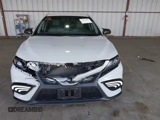 2022 Toyota Camry SE z VIN 4T1G11AK5NU019057, wystawiony jako IAAI lot #42009182 z przebiegiem 48 250 mil mil oraz . Historia ofert i sprzedaży dostępna na DreamBid. Obrazek 13.