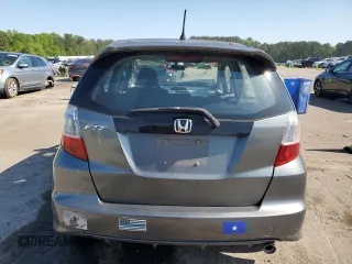 2011 Honda Fit Sport z VIN JHMGE8H5XBC002174, wystawiony jako Copart lot #52220125 z przebiegiem 161 816 mil mil oraz Szkody całkowita. Historia ofert i sprzedaży dostępna na DreamBid. Obrazek 6.