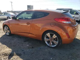 2016 Hyundai Veloster with VIN KMHTC6AD4GU299905, listed as a Copart auction lot 70453733 with 72,665 mi miles. Bid and sale history available at carsss.com. Image 2.