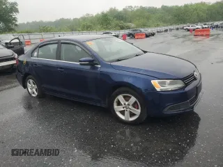 2013 Volkswagen Jetta TDI w/Premium with VIN 3VW3L7AJ2DM387655, listed as a Copart auction lot 56869615 with Not provided miles and Clean title. Bid and sale history available at DreamBid. Image 4.