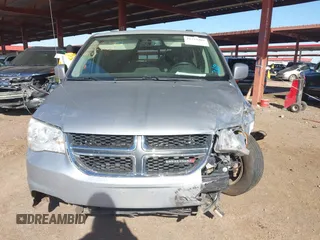 2015 Dodge Grand Caravan SXT with VIN 2C4RDGCG1FR649074, listed as a IAAI auction lot 41759409 with 116,856 mi miles and . Bid and sale history available at DreamBid. Image 13.