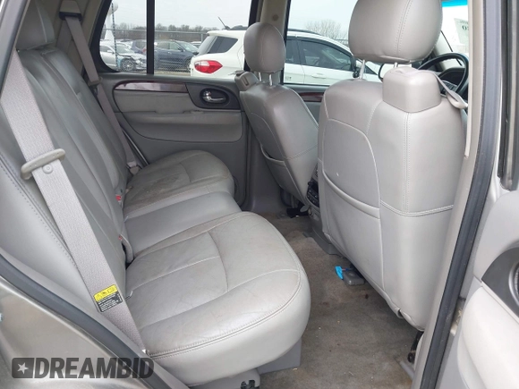 2005 GMC Envoy SLT with VIN 1GKDT13S352129944, listed as a IAAI auction lot 41527180 with 188,541 mi miles. Bid and sale history available at carsss.com. Image 8.