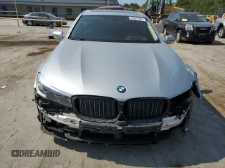 2018 BMW 7 Series 740e xDrive iPerformance with VIN WBA7J2C51JG938447, listed as a Copart auction lot 63021064 with 81,105 mi miles and Salvage Title. Bid and sale history available at carsss.com. Image 5.