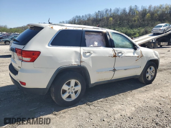 2011 Jeep Grand Cherokee Laredo with VIN 1J4RR4GG8BC724196, listed as a Copart auction lot 51760195 with 79,407 mi miles and Salvage Title. Bid and sale history available at DreamBid. Image 3.
