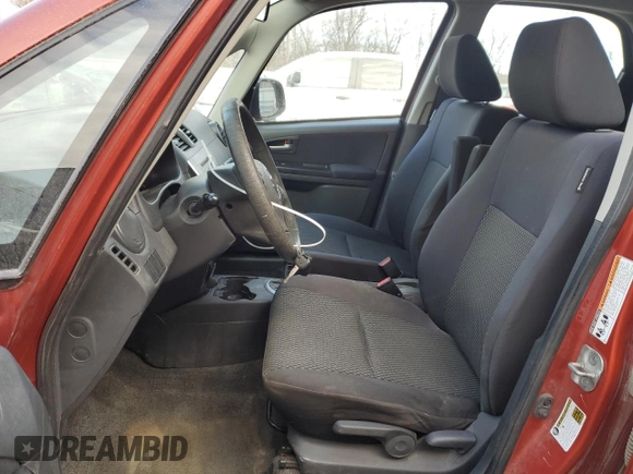2013 Suzuki SX4 Crossover z VIN JS2YB5A37D6100222, wystawiony jako Copart lot #86614504 z przebiegiem 131 930 mil mil oraz Szkoda całkowita • Salvage title. Historia ofert i sprzedaży dostępna na DreamBid. Obrazek 7.