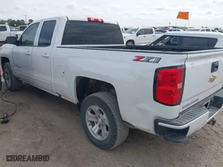 2018 Chevrolet Silverado 1500 LT with VIN 1GCVKREC0JZ315238, listed as a IAAI auction lot 41856052 with 163,131 mi miles. Bid and sale history available at carsss.com. Image 3.