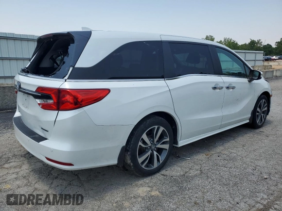 2023 Honda Odyssey Touring with VIN 5FNRL6H84PB016614, listed as a Copart auction lot 59336585 with 36,932 mi miles and Salvage title. Bid and sale history available at DreamBid. Image 3.