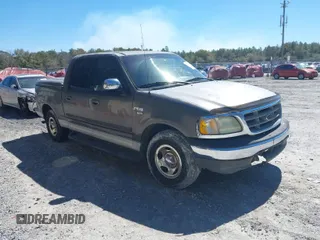 2002 Ford F-150 XLT with VIN 1FTRW07642KC65138, listed as a IAAI auction lot 41739516 with 354,140 mi miles. Bid and sale history available at carsss.com. Image 1.