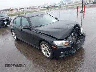 2014 BMW 3 Series 320i xDrive with VIN WBA3C3C53EP662342, listed as a IAAI auction lot 42314605 with 106,923 mi miles and . Bid and sale history available at DreamBid. Image 1.