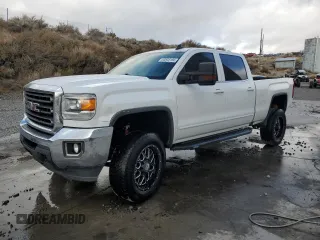 2018 GMC Sierra 2500HD SLE с VIN 1GT12SEG8JF182089, выставлен на аукционе Copart как лот 83803194 с пробегом 78 469 миль миль и Списание • Salvage title. История ставок и продаж доступна на DreamBid. Изображение 1.
