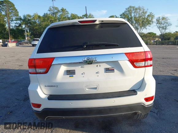 2011 Jeep Grand Cherokee Laredo with VIN 1J4RS4GGXBC739433, listed as a IAAI auction lot 41794031 with 174,672 mi miles and . Bid and sale history available at DreamBid. Image 17.