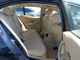 2012 BMW 3 Series 328i with VIN WBA3C1C58CA696975, listed as a IAAI auction lot 42507653 with 136,036 mi miles and . Bid and sale history available at DreamBid. Image 8.
