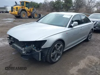2015 Audi A6 3.0T Prestige with VIN WAUHGAFC5FN026947, listed as a IAAI auction lot 41718442 with 110,410 mi miles. Bid and sale history available at carsss.com. Image 2.