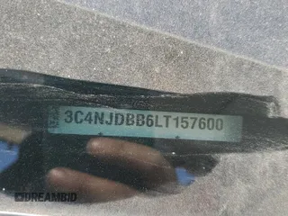2020 Jeep Compass Latitude with VIN 3C4NJDBB6LT157600, listed as a Copart auction lot 52411235 with 82,159 mi miles and Salvage title. Bid and sale history available at DreamBid. Image 13.