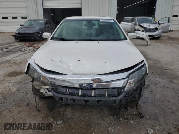2012 Ford Fusion SEL z VIN 3FAHP0JA3CR184074, wystawiony jako Copart lot #51973675 z przebiegiem 192 732 mil mil oraz Szkoda całkowita • Salvage title. Historia ofert i sprzedaży dostępna na DreamBid. Obrazek 5.