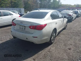 2014 Infiniti Q50 Premium with VIN JN1BV7AR5EM703788, listed as a IAAI auction lot 42118192 with 153,859 mi miles and . Bid and sale history available at DreamBid. Image 4.