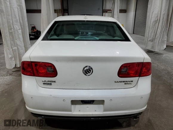 2010 Buick Lucerne CXL with VIN 1G4HC5EM8AU106608, listed as a Copart auction lot 49465595 with 98,789 mi miles and Salvage Title. Bid and sale history available at DreamBid. Image 6.
