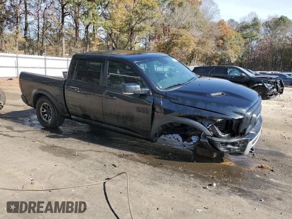 2017 Ram 1500 Rebel z VIN 1C6RR6YT7HS523912, wystawiony jako Copart lot #83148244 z przebiegiem Nie podano mil oraz Szkoda całkowita • Salvage title. Historia ofert i sprzedaży dostępna na DreamBid. Obrazek 4.