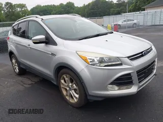 2014 Ford Escape Titanium с VIN 1FMCU0J98EUC28001, выставлен на аукционе IAAI как лот 42442784 с пробегом 163 159 миль миль и . История ставок и продаж доступна на DreamBid. Изображение 1.