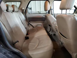 2009 Mercury Mariner Premier with VIN 4M2CU97G39KJ24459, listed as a Copart auction lot 83041574 with 123,437 mi miles and Salvage Title. Bid and sale history available at carsss.com. Image 11.