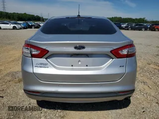 2015 Ford Fusion SE z VIN 3FA6P0H70FR265071, wystawiony jako Copart lot #55843685 z przebiegiem 137 104 mil mil oraz Szkoda całkowita • Salvage title. Historia ofert i sprzedaży dostępna na DreamBid. Obrazek 6.
