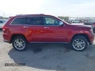 2014 Jeep Grand Cherokee Summit with VIN 1C4RJFJG6EC328516, listed as a IAAI auction lot 40698068 with 195,798 mi miles and . Bid and sale history available at DreamBid. Image 13.