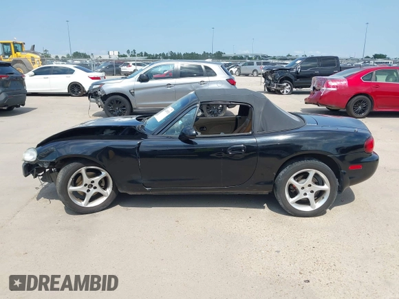2002 Mazda MX-5 Miata Cloth with VIN JM1NB353520221312, listed as a IAAI auction lot 42410028 with 99,375 mi miles and . Bid and sale history available at DreamBid. Image 15.