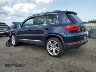 2016 Volkswagen Tiguan SEL with VIN WVGAV7AXXGW555809, listed as a Copart auction lot 55177805 with 40,676 mi miles and Salvage Title. Bid and sale history available at DreamBid. Image 2.