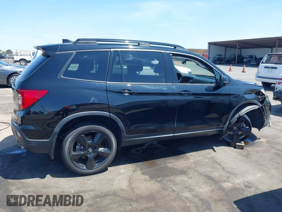 2021 Honda Passport Elite with VIN 5FNYF8H07MB003506, listed as a IAAI auction lot 42571906 with 42,323 mi miles and . Bid and sale history available at DreamBid. Image 14.