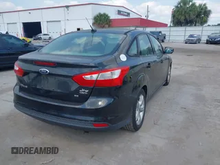 2014 Ford Focus SE with VIN 1FADP3F22EL102502, listed as a IAAI auction lot 41969213 with 154,946 mi miles. Bid and sale history available at carsss.com. Image 4.