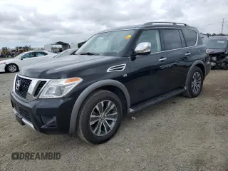 2018 Nissan Armada SL z VIN JN8AY2NC1JX502296, wystawiony jako Copart lot #53389055 z przebiegiem 129 237 mil mil oraz Czysty tytuł • Clean title. Historia ofert i sprzedaży dostępna na DreamBid. Obrazek 1.