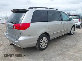 2009 Toyota Sienna XLE with VIN 5TDBK22C89S022909, listed as a IAAI auction lot 42139786 with 107,247 mi miles and . Bid and sale history available at DreamBid. Image 4.