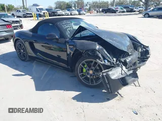 2014 Porsche Boxster with VIN WP0CA2A81ES121657, listed as a IAAI auction lot 41476691 with 28,127 mi miles and . Bid and sale history available at DreamBid. Image 1.