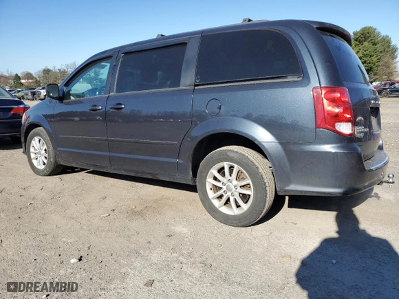2013 Dodge Grand Caravan SXT with VIN 2C4RDGCG4DR716540, listed as a Copart auction lot 50682765 with 112,929 mi miles and Salvage Title. Bid and sale history available at carsss.com. Image 2.