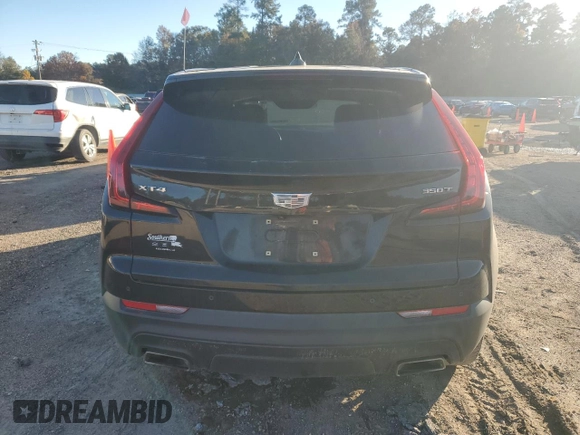 2021 Cadillac XT4 FWD Luxury с VIN 1GYAZAR4XMF066381, выставлен на аукционе Copart как лот 84615464 с пробегом 80 018 миль миль и Списание • Salvage title. История ставок и продаж доступна на DreamBid. Изображение 6.