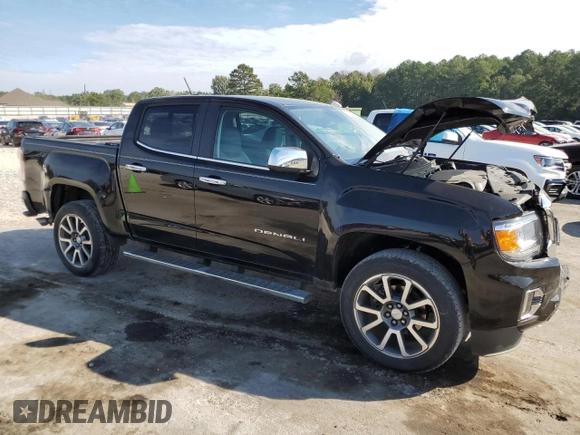 2021 GMC Canyon 2WD Denali with VIN 1GTG5EEN3M1192709, listed as a Copart auction lot 73865224 with 90,575 mi miles and Salvage Title. Bid and sale history available at carsss.com. Image 4.