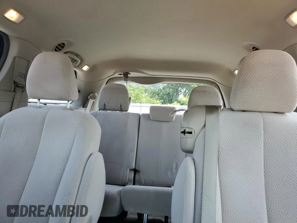 2013 Toyota Sienna LE AAS with VIN 5TDKK3DC4DS404544, listed as a Copart auction lot 60274615 with 94,933 mi miles and Salvage title. Bid and sale history available at DreamBid. Image 10.