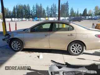 2004 Lexus ES 330 with VIN JTHBA30G340003869, listed as a IAAI auction lot 42024907 with 240,425 mi miles. Bid and sale history available at carsss.com. Image 15.