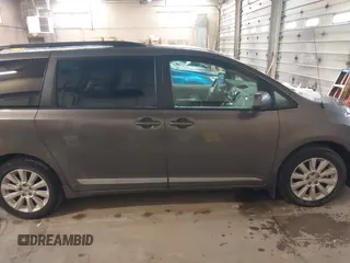2014 Toyota Sienna LE with VIN 5TDJK3DC9ES071870, listed as a IAAI auction lot 41133491 with 82,134 mi miles. Bid and sale history available at carsss.com. Image 13.