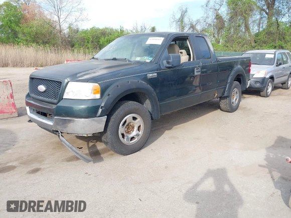 2005 Ford F-150 XLT with VIN 1FTPX14555NA51705, listed as a IAAI auction lot 42098365 with 162,409 mi miles. Bid and sale history available at carsss.com. Image 2.