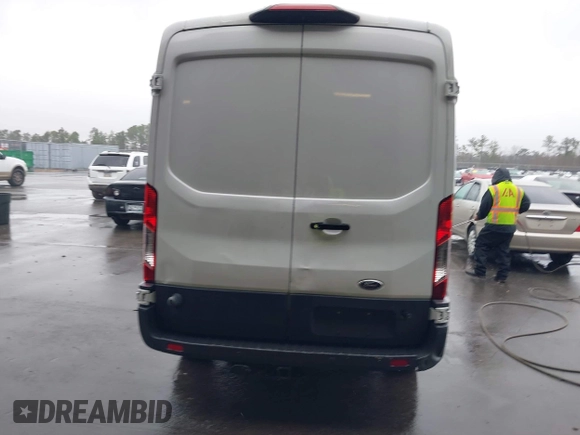 2018 Ford Transit with VIN 1FTBW2CMXJKA90555, listed as a IAAI auction lot 41539215 with 87,913 mi miles and . Bid and sale history available at DreamBid. Image 16.