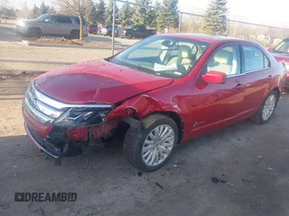 2011 Ford Fusion Hybrid with VIN 3FADP0L3XBR342051, listed as a IAAI auction lot 41880330 with 118,776 mi miles and . Bid and sale history available at DreamBid. Image 2.