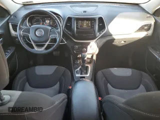 2014 Jeep Cherokee Altitude with VIN 1C4PJMCS9EW232388, listed as a Copart auction lot 82842674 with 169,458 mi miles and Salvage Title. Bid and sale history available at carsss.com. Image 8.