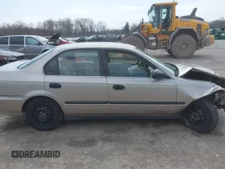 2000 Honda Civic LX with VIN 1HGEJ6670YL030749, listed as a IAAI auction lot 42112694 with 153,903 mi miles. Bid and sale history available at carsss.com. Image 13.