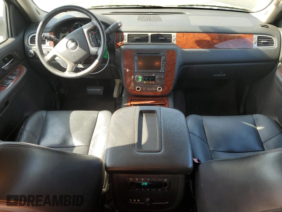 2009 Chevrolet Tahoe LTZ with VIN 1GNFK33089R139455, listed as a Copart auction lot 58953995 with 176,029 mi miles and Salvage title. Bid and sale history available at DreamBid. Image 8.