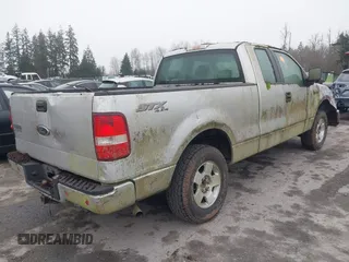 2005 Ford F-150 STX with VIN 1FTRX14W55FB01059, listed as a IAAI auction lot 41278921 with 183,193 mi miles. Bid and sale history available at carsss.com. Image 4.